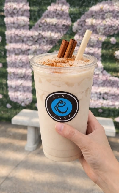 Iced horchata topped with cinnamon sticks